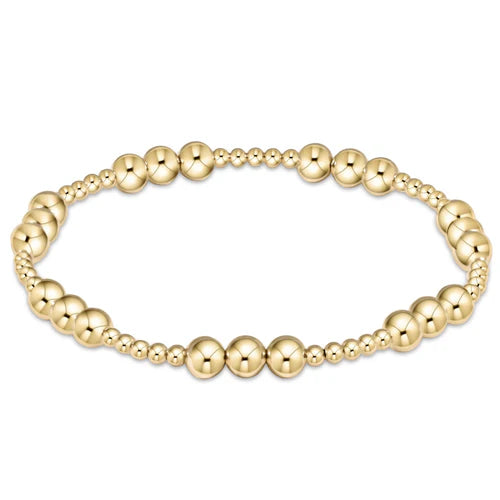 classic joy pattern 5mm bead bracelet - gold by enewton